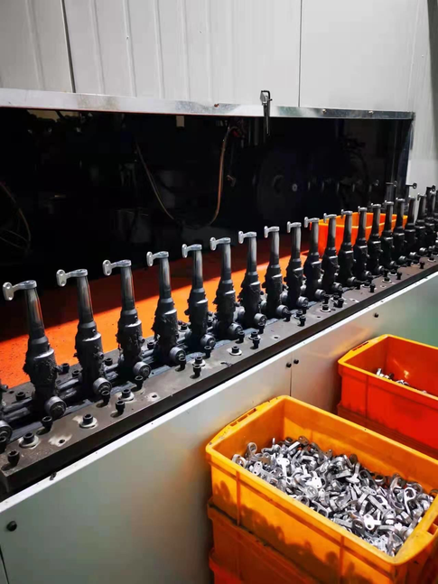 Production cell with finished metal hinge components